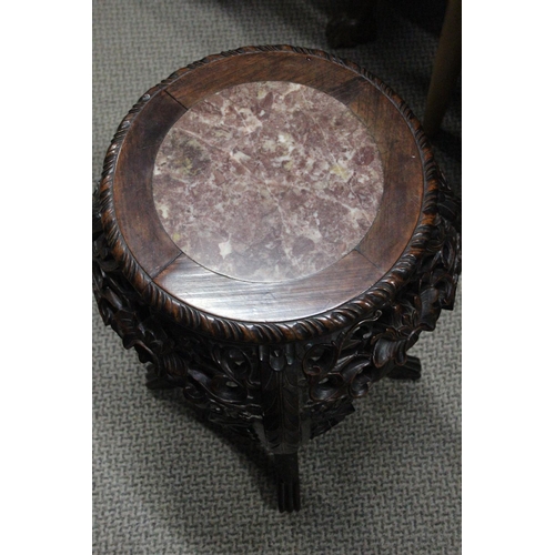 462B - A stunning Chinese Marble topped plantstand. Measuring approx 25inches.