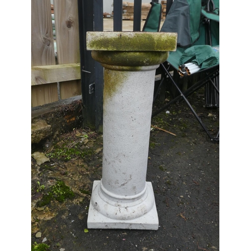 68 - A concrete pedestal base. 22 inch height x 8 inch width.