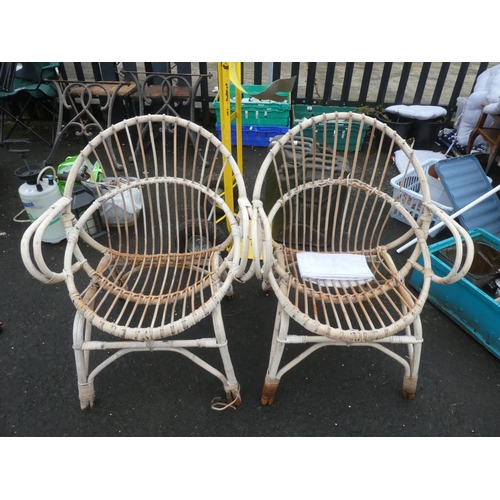 76 - Two retro bamboo framed garden chairs.