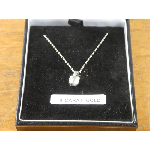 106 - A 9ct White Gold necklace with CZ pendant.