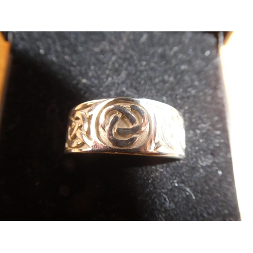 115 - A Sterling Silver 'Celtic' design ring, size O-P