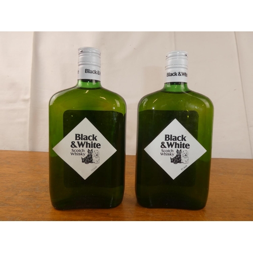 118 - Two bottles of Black & White Scottish Whisky, 13 1/3 fl.oz .