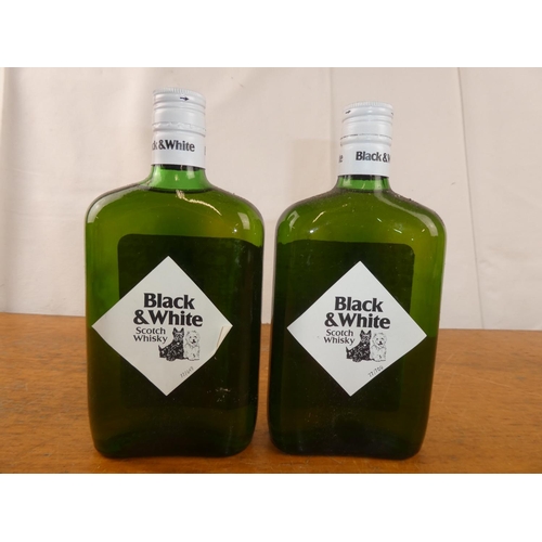 119 - Two bottles of Black & White Scottish Whisky, 13 1/3 fl.oz.