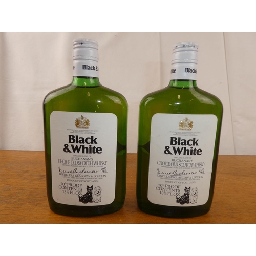 121 - Two bottles of Black & White Scottish Whisky, 13 1/3 fl.oz.