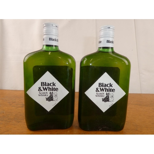 121 - Two bottles of Black & White Scottish Whisky, 13 1/3 fl.oz.