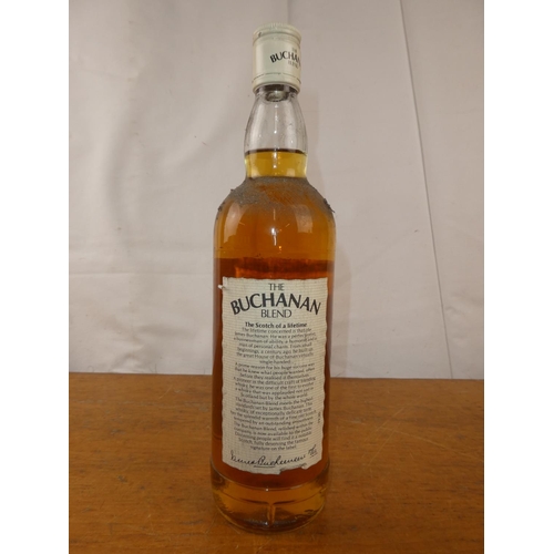 123 - A vintage bottle of Buchanan blend fine old Scotch Whisky, 75cl.