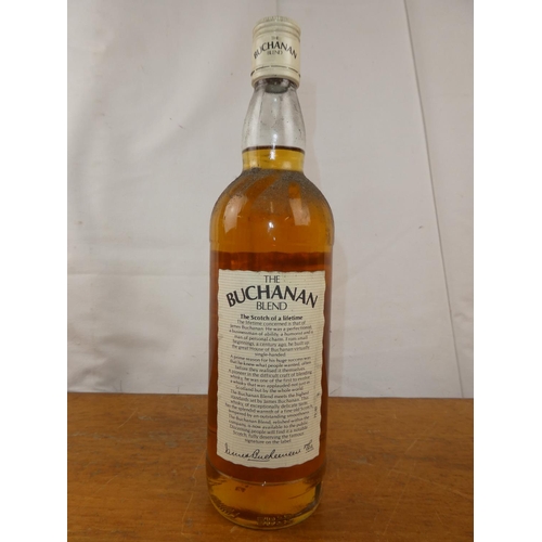 124 - A vintage bottle of Buchanan blend fine old Scotch Whisky, 75cl.