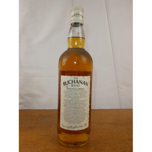 125 - A vintage bottle of Buchanan blend fine old Scotch Whisky, 75cl.