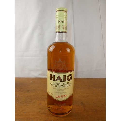 131 - A vintage bottle of Haig Scottish Whisky, 75cl.