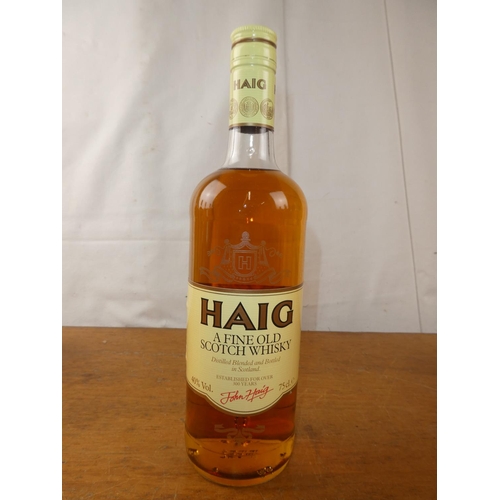 132 - A vintage bottle of Haig Scottish Whisky, 75cl.