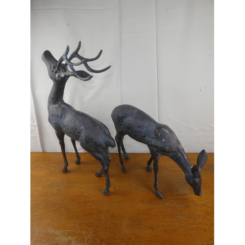 133 - A large pair of metal deer figures, each measuring Buck: 23 inch height x 13 inch length. Doe: 14 in... 