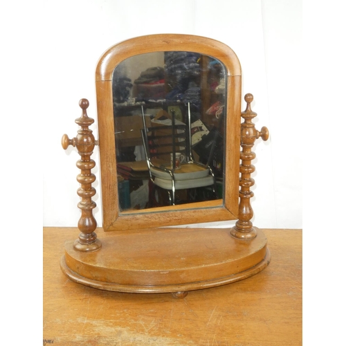 137 - An antique dressing table mirror.