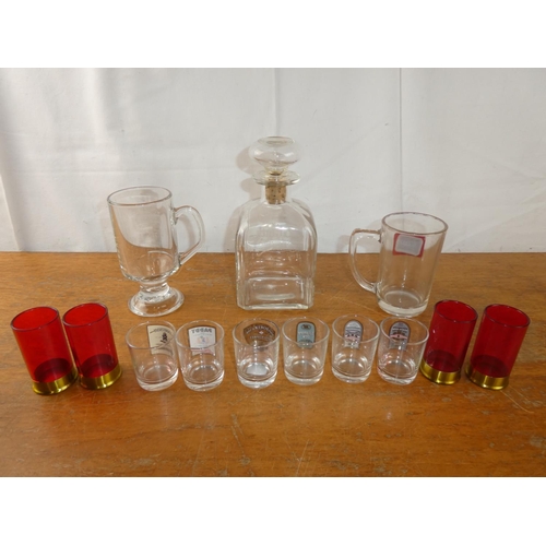 150 - A 'Grants' whisky decanter and an assorted lot of glasses to include a set of four shot glasses.