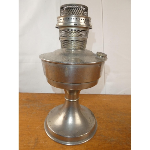 156 - A vintage metal based oil lamp.