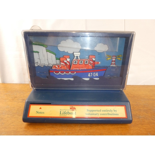 158 - A vintage Royal National Lifeboat collection box.