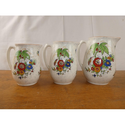 167 - A trio of Crown Ducal jugs.