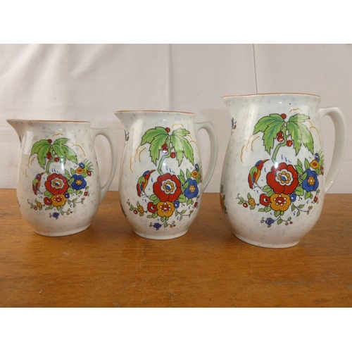 167 - A trio of Crown Ducal jugs.