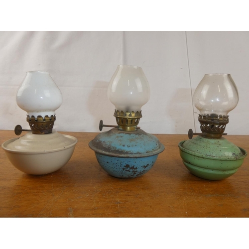 170 - Three vintage pixie oil lamps.