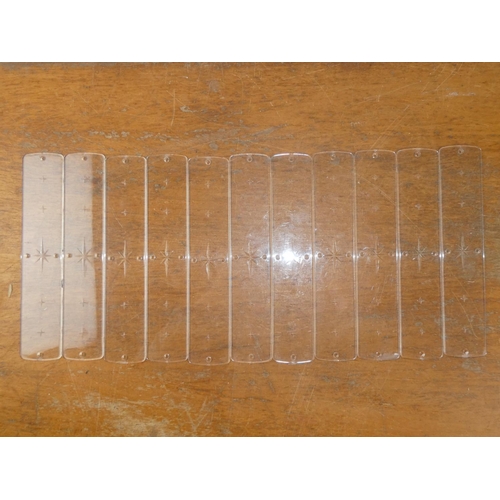 175 - A set of 11 vintage clear lucite door plates.