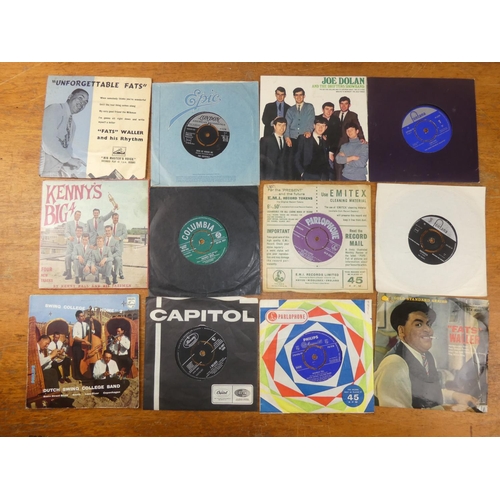 181 - A vintage Winel Carrying Case and an assorted lot of 45's records to include The Beatles 'Twist and ... 