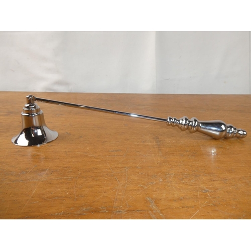 185 - A candle snuffer.