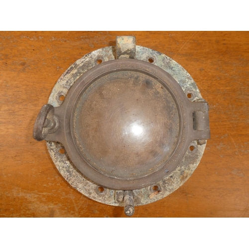 187 - An antique porthole. 12 inch height x  x 4.5 inch width