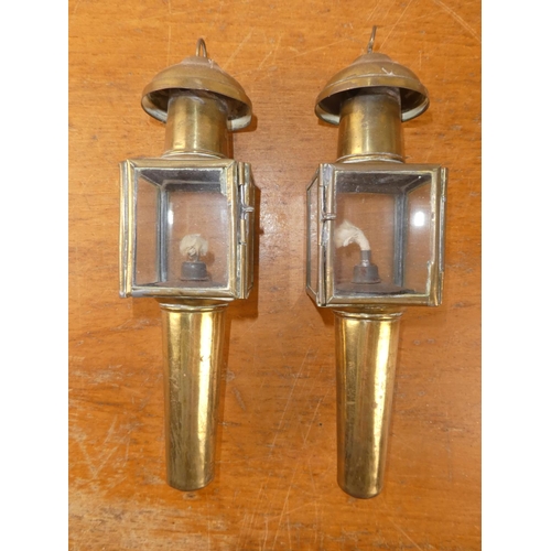 190 - A pair of brass carriage style lamps.