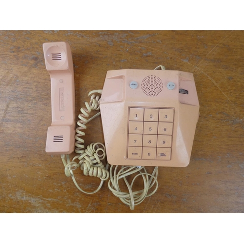 192 - A vintage pink Audioline telephone.