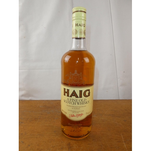 193 - A vintage bottle of Haig Scottish Whisky, 75cl.