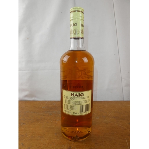 193 - A vintage bottle of Haig Scottish Whisky, 75cl.