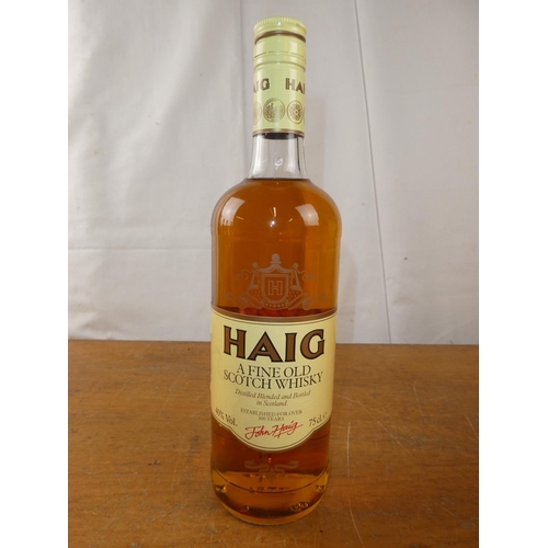 194 - A vintage bottle of Haig Scottish Whisky, 75cl.