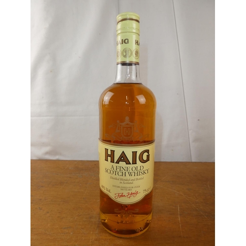 196 - A vintage bottle of Haig Scottish Whisky, 75cl.