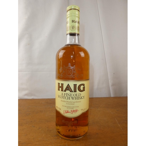 197 - A vintage bottle of Haig Scottish Whisky, 75cl.