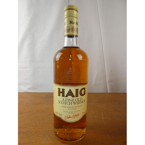 201 - A vintage bottle of Haig Scottish Whisky, 75cl.