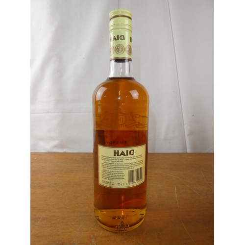 201 - A vintage bottle of Haig Scottish Whisky, 75cl.