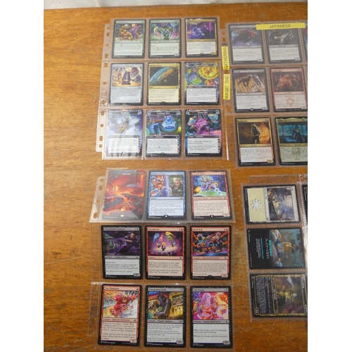 90 - A lot of assorted Pokemon Trading Cards to include Japanese Magic the Gathering and more.