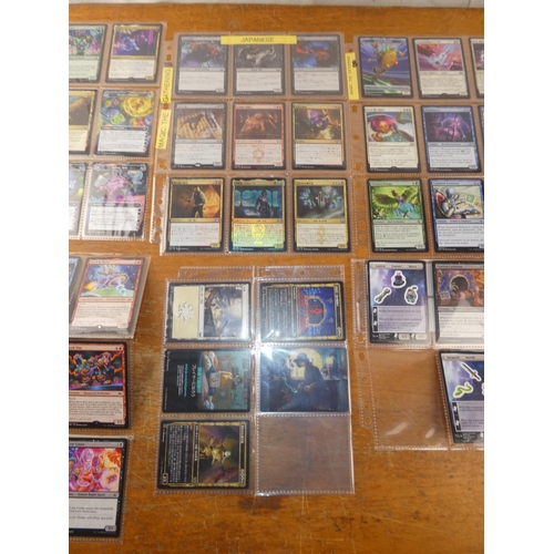 90 - A lot of assorted Pokemon Trading Cards to include Japanese Magic the Gathering and more.