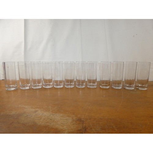 211 - A boxed set of 12 vintage Schweppes glasses.