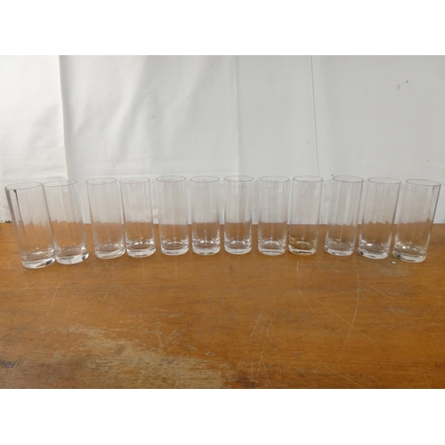 211 - A boxed set of 12 vintage Schweppes glasses.