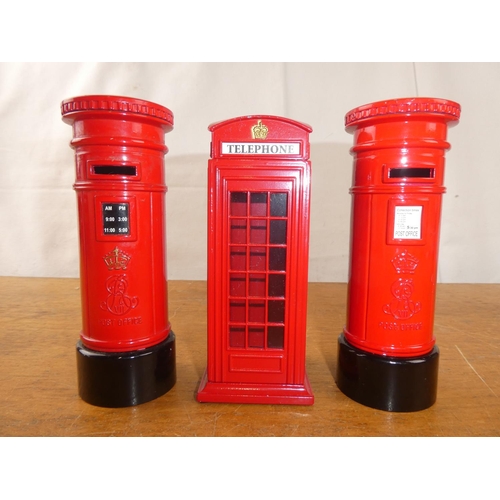 212 - Three metal post box money boxes.