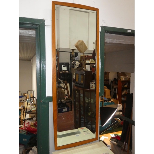 220 - A vintage framed bevelled glass wall mirror. 
48 inch height x 17 inch length