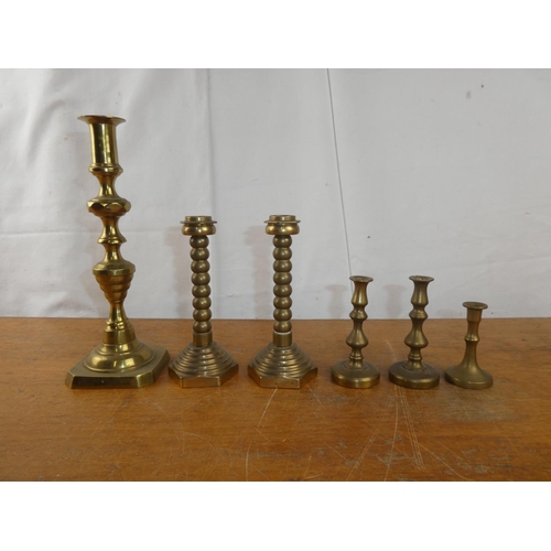 226 - Two pairs of vintage brass candlesticks and more.