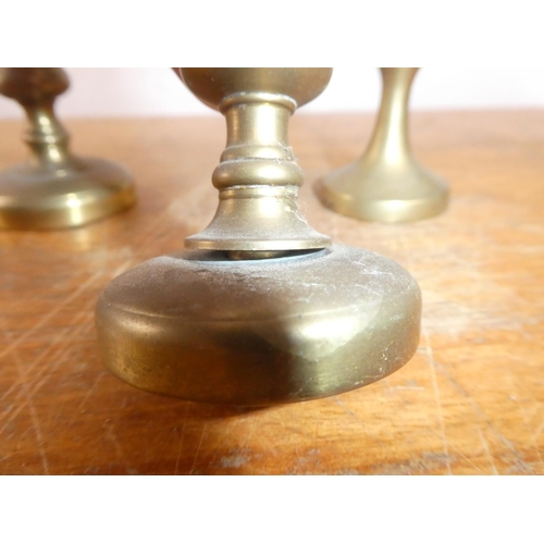 226 - Two pairs of vintage brass candlesticks and more.