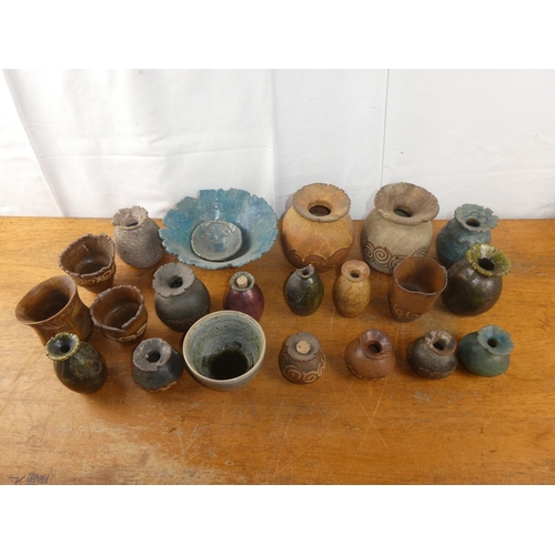 237 - A large lot of studio pottery.