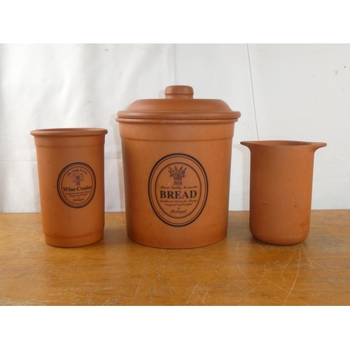 248 - A three piece terracotta kitchen set.