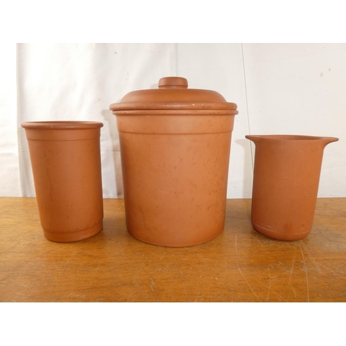 248 - A three piece terracotta kitchen set.