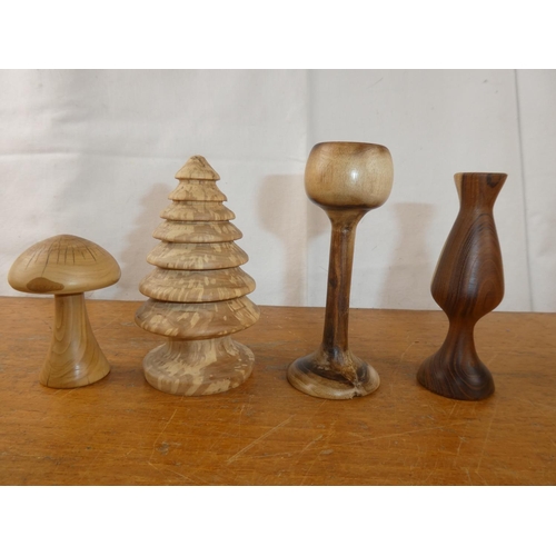 254 - A collection of wood turned items, to include a mushroom, tree & more.