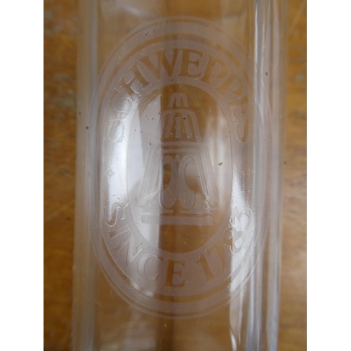 211 - A boxed set of 12 vintage Schweppes glasses.