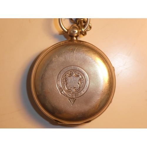 165 - An antique Sterling Silver pocket watch, fob chain and key, produced by J.C. Graves Sheffield. 'The ... 