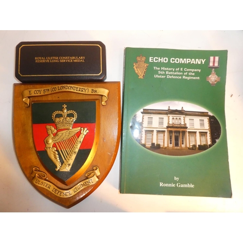 235 - A collection of R.U.C & UDR items to include leather pistol holster, cap, plaque & book etc.